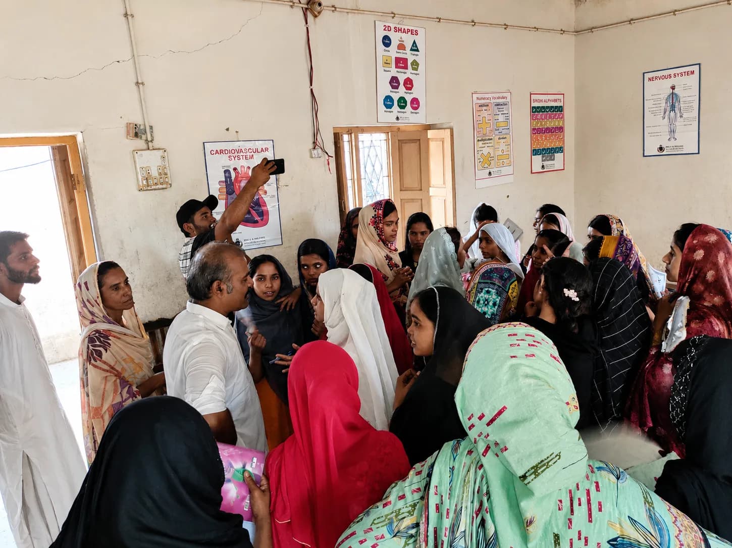 Community members supporting Suhaai learning work